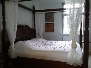 Postel nebo postele na pokoji v ubytování Hals Hotel