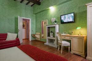 TV a/nebo společenská místnost v ubytování Navona Tower Relais