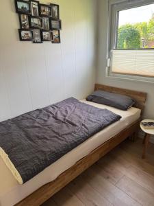 Postel nebo postele na pokoji v ubytování Tiny House Rudis Ruheoase