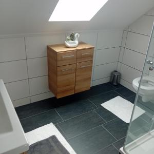 a bathroom with a sink and a toilet at Steggasse1 in Oberschützen +5 photos