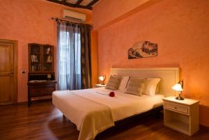 Postel nebo postele na pokoji v ubytování Navona Tower Relais