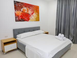 Postel nebo postele na pokoji v ubytování Hotel Adria