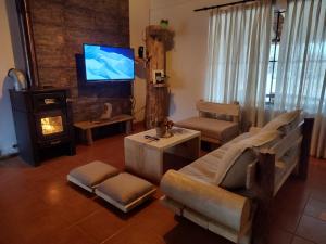 TV a/nebo společenská místnost v ubytování La Posada de Buda