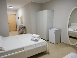 Postel nebo postele na pokoji v ubytování Hotel Adria
