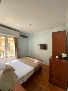 Voodi või voodid majutusasutuse Manzzel Cairo House toas