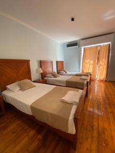 Voodi või voodid majutusasutuse Manzzel Cairo House toas