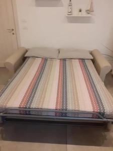 a mattress sitting on the floor in a room at Cozy studio Monterosso al Mare 22 m² with air conditioning in Monterosso al Mare