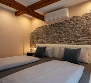 Giường trong phòng chung tại Ferienhaus Nißmitz No.32 +69 ảnh