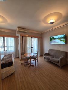 TV a/nebo společenská místnost v ubytování Flat Particular em Hotel - Alameda Lorena - SP