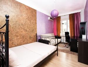 Cama o camas de una habitación en ApartLux Kremlyovskaya