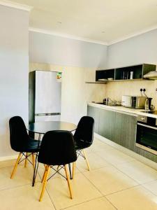 Η κουζίνα ή μικρή κουζίνα στο Eastview Aparthotel in Bemcoville +15 φωτογραφίες