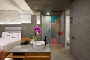 Llit o llits en una habitació de David Hotel