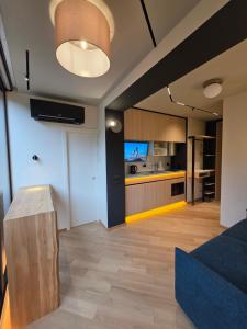 Virtuvė arba virtuvėlė apgyvendinimo įstaigoje Modular Port view studio