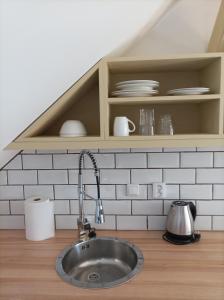 Kuchyňa alebo kuchynka v ubytovaní Apartmán Na statku