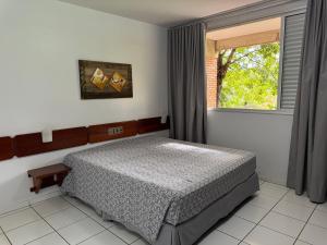 Cama ou camas em um quarto em diRoma Thermas direto com o Grupo diRoma com acesso ao Acqua Park e Café da manhã