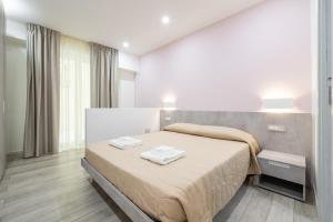 Postel nebo postele na pokoji v ubytování Mare Nostrum