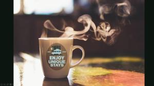 a coffee cup with smoke coming out of it at Saluda Summit Cabin at Cabin Fever in Saluda