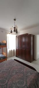 a bedroom with a large bed and a window at Casa FLAVIANO in Pizzo +9 photos