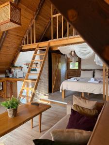 a room with a loft with a bed and a staircase at Tenora in Rize +45 photos