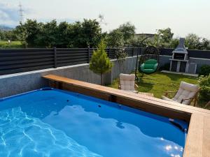 a swimming pool on the roof of a house at Tenora in Rize