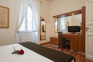 Postel nebo postele na pokoji v ubytování Navona Tower Relais