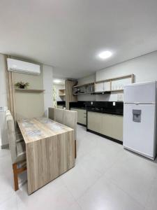 Kuchyň nebo kuchyňský kout v ubytování R3- Apto Cataratas - Central