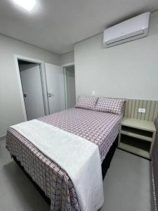 Postel nebo postele na pokoji v ubytování R3- Apto Cataratas - Central + 6 fotografií