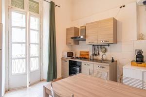 Cucina o angolo cottura di Charm in Piazza Castello