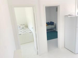 Postel nebo postele na pokoji v ubytování Casinha da praia