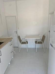 Kuchyň nebo kuchyňský kout v ubytování Casinha da praia