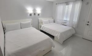 Postel nebo postele na pokoji v ubytování Palm Breeze Hotel + 49 fotografií