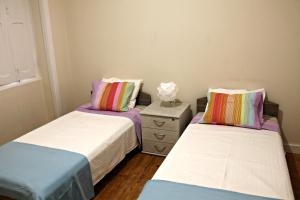 Voodi või voodid majutusasutuse Sintra - Casa da Portela toas