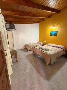 Ένα ή περισσότερα κρεβάτια σε δωμάτιο στο Complejo de la Villa - Apart Hotel +35 φωτογραφίες