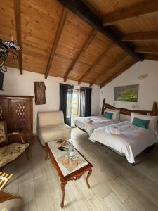 Postel nebo postele na pokoji v ubytování Geko Hotels