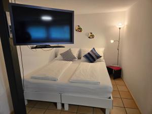 A bed or beds in a room at Studio Mario