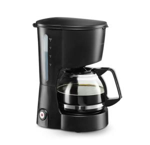 a black coffeemaker with a glass mug on it at Luxe Chalet op camping Duindoorn, IJmuiden aan Zee, in de buurt van F1 circuit Zandvoort en Bloemendaal op loopafstand strand in IJmuiden