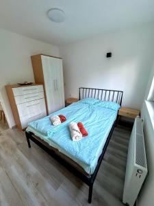 Ένα ή περισσότερα κρεβάτια σε δωμάτιο στο Apartmani Fazinasa