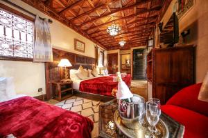 Postel nebo postele na pokoji v ubytování Riad Africa + 37 fotografií