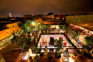 an overhead view of a building with potted plants at Riad Africa - Marrakech Medina Maison d'Hote in Marrakesh