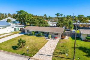 an aerial view of a house with a yard at 721 Java Rd in Cocoa Beach