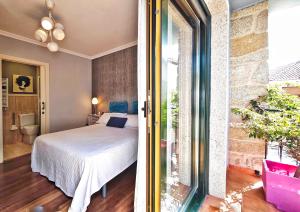 Posteľ alebo postele v izbe v ubytovaní Casa piscina boleros