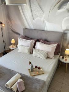 Ένα ή περισσότερα κρεβάτια σε δωμάτιο στο Simplicity Luxury Living