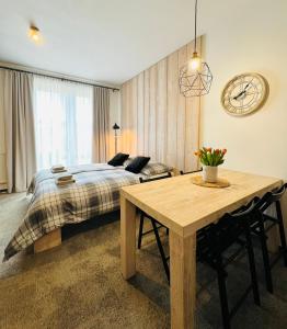 Posteľ alebo postele v izbe v ubytovaní Apartmány na sjezdovce Dolní Morava