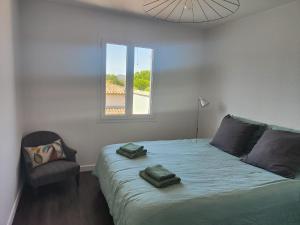 En eller flere senge i et værelse på La Maison des Tuileries