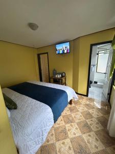 Postel nebo postele na pokoji v ubytování Casa SOL DE VERANO