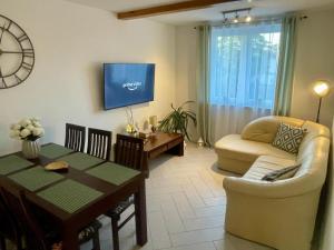 Televisyen dan/atau pusat hiburan di Mazury Szczytno - Centrum II - Apartamenty u Krzyżaka