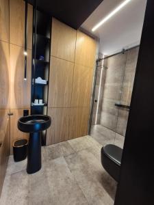 Koupelna v ubytování Luksusowy apartament 8 z jacuzzi + 25 fotografií