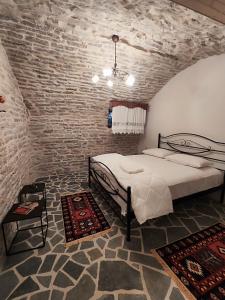 Postel nebo postele na pokoji v ubytování Guri Guesthouse