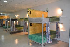 a group of bunk beds in a room at Albergue Valle del Nonaya in Salas
