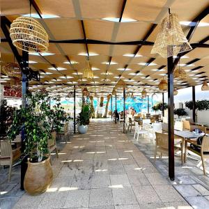 Un restaurant sau alt loc unde se poate mânca la Beach, pool and slides Sousse Monastir 41